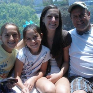 Carson with he three daughters at Disneyland